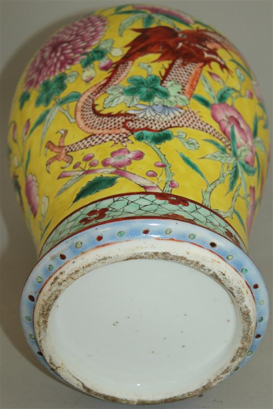 A Chinese yellow ground dragon baluster vase, late 19th century, 30cm